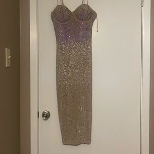 This is a dress, it’s a tan color, you can wear this for any occasion. S-L